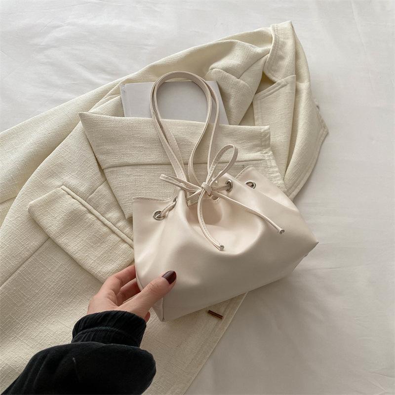 Underarm Bag Women's New Niche Design High Value Bow Fashionable Commuter One Shoulder Hand Bucket Bag