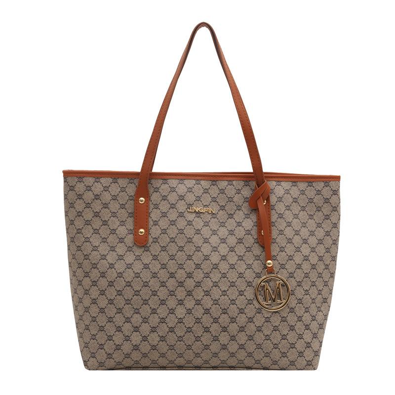 

Сумка большой вместимости женская дорожная персонализированная сумка-тоут 2025 новая красивая нишевая трендовая сумка через плечо текстурированная женская сумка серый