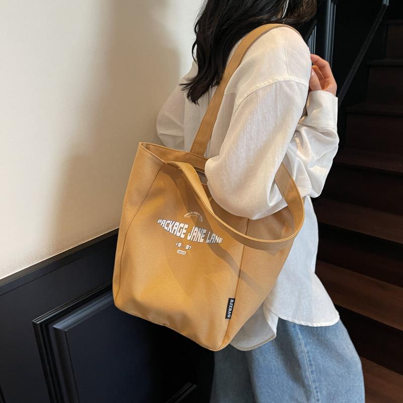 2026 Women's Large Capacity Canvas Tote Bag - Versatile Single Shoulder Bag for Autumn/Winter Commute and College.