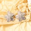 The silver alloy floral stud earrings with a cold and elegant style are versatile for daily, casual and commuting women