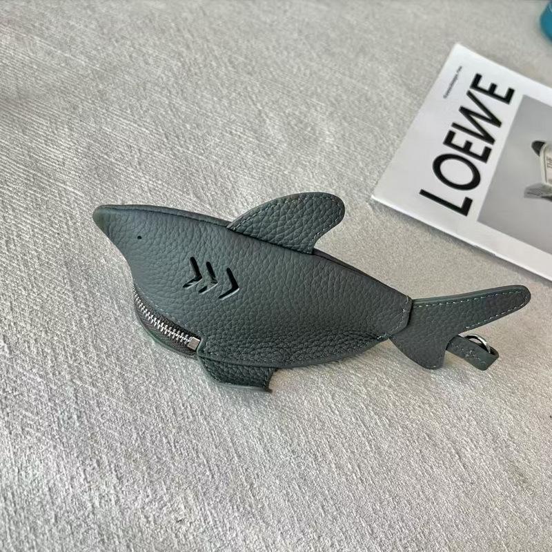 New leather dolphin change bag, keychain pendant, cute fashion earphones, lipstick storage bag.