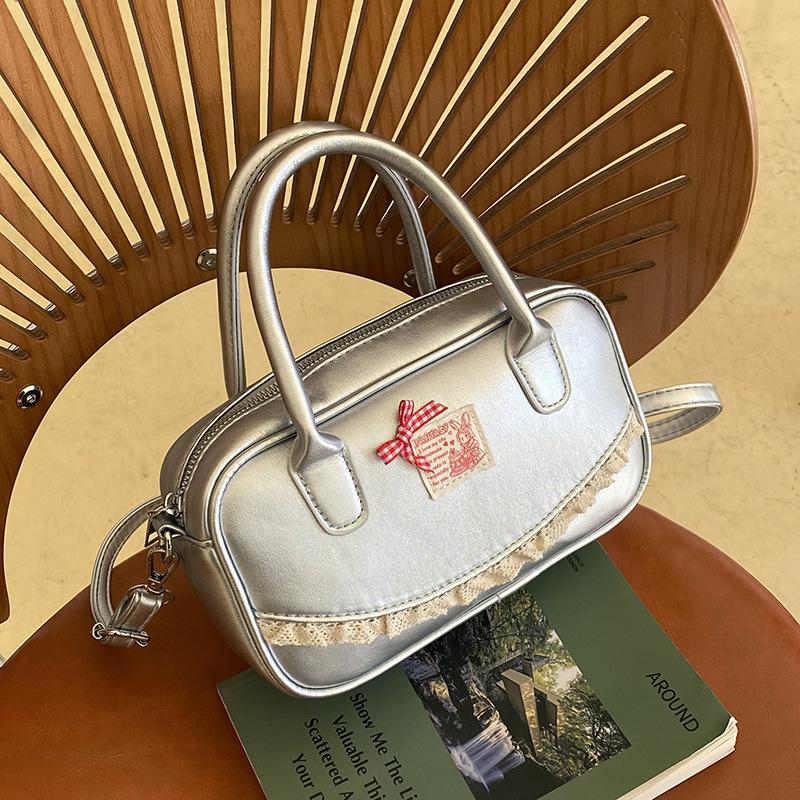 Korean ins hand-held bowling bag women's 2025 spring new fashion shoulder oblique span bag high-end small square bag