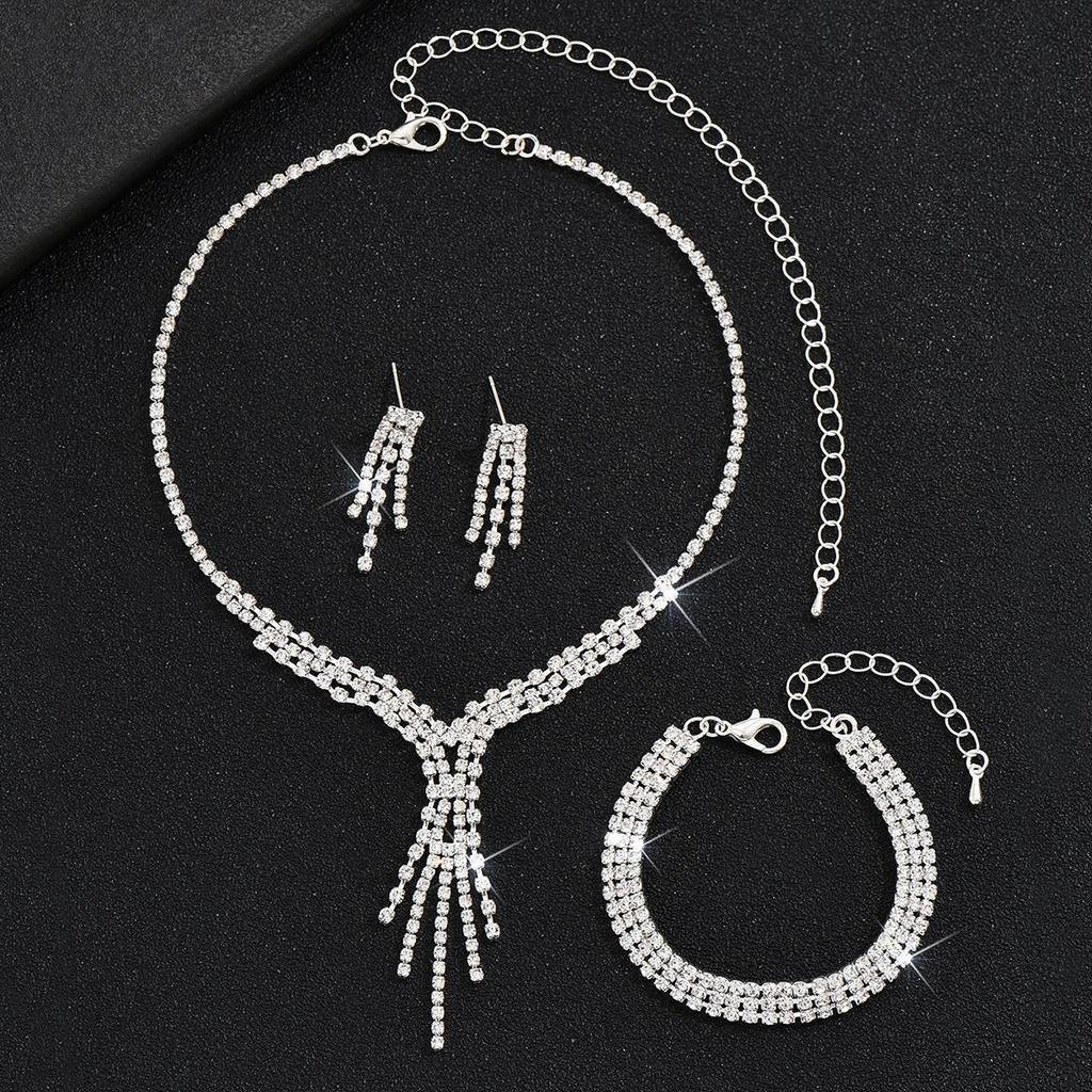 Elegantná svetlá luxusná retiazka na kľúčnu kosť: Trblietavý diamantový náhrdelník s strapcami, náušnice, sada náramkov - Dámske európske a americké módne doplnky