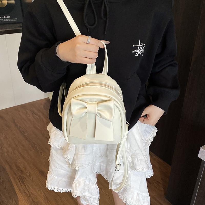 Süßer Mini-Rucksack mit Schmetterlings-Schleife aus PU-Material für den täglichen Gebrauch