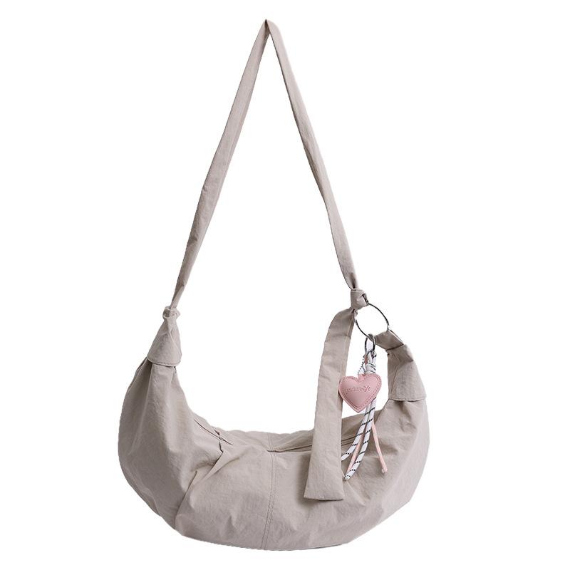 

Large capacity Taslon messenger bag women s 2025 new women s tote dumpling bag commuter cloth bag shoulder backpack no pendant