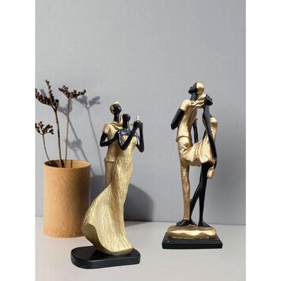 Stylish Golden Black Resin Romantic Couple Statues for Home Decor (Pack of 2, Black & Golden)