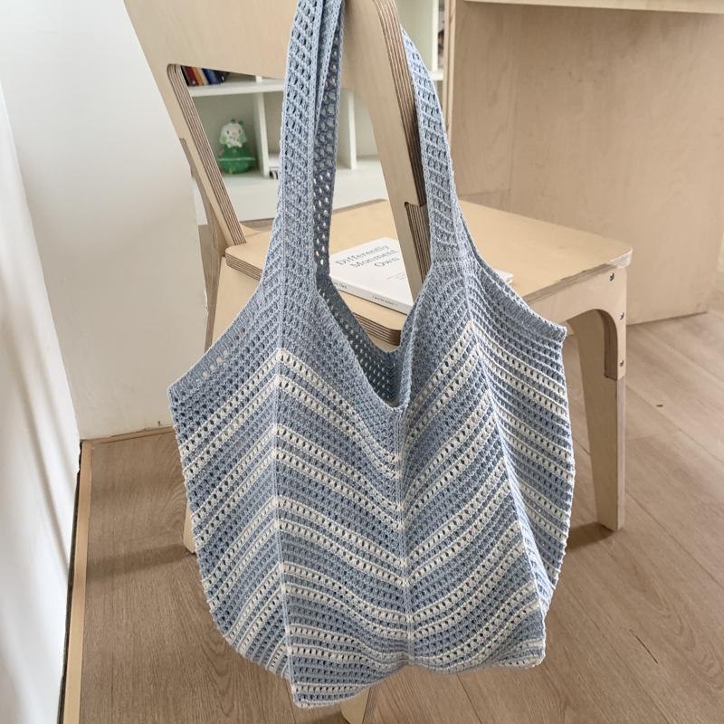 

Woven shoulder bag women s large-capacity new hollow knitted relaxation seaside vacation tote bag светло-синий