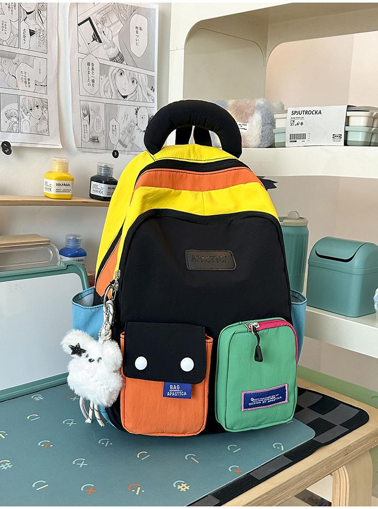 Schoolbag contrasting splicing Internet celebrity backpack female dopamine primary school bag Japanese large capacity burden reduction junior high