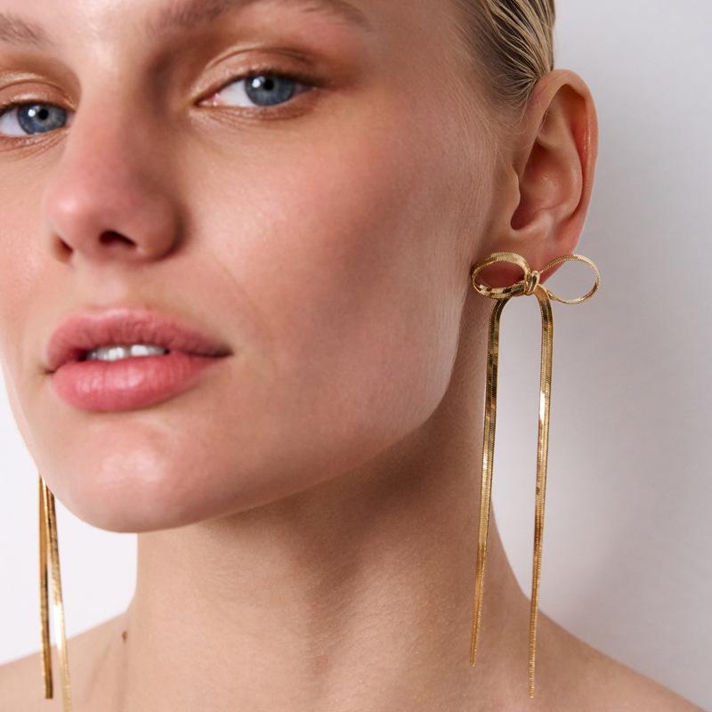 European-American Bow Snake Bone Stud Earrings: Luxurious, High-End Fashion for Women