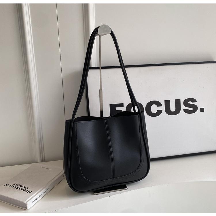 

Элегантная женская сумка-тоут в виде ведра большого объема однотонного цвета 2024 года - Идеально подходит для работы и поездок