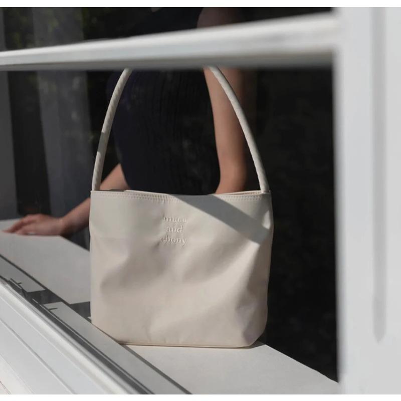 Korean Version of Ins Embroidered High Elastic Waterproof Nylon Bucket Bag Fashionable and Versatile Casual Underarm Single Shoulder Women's Bag