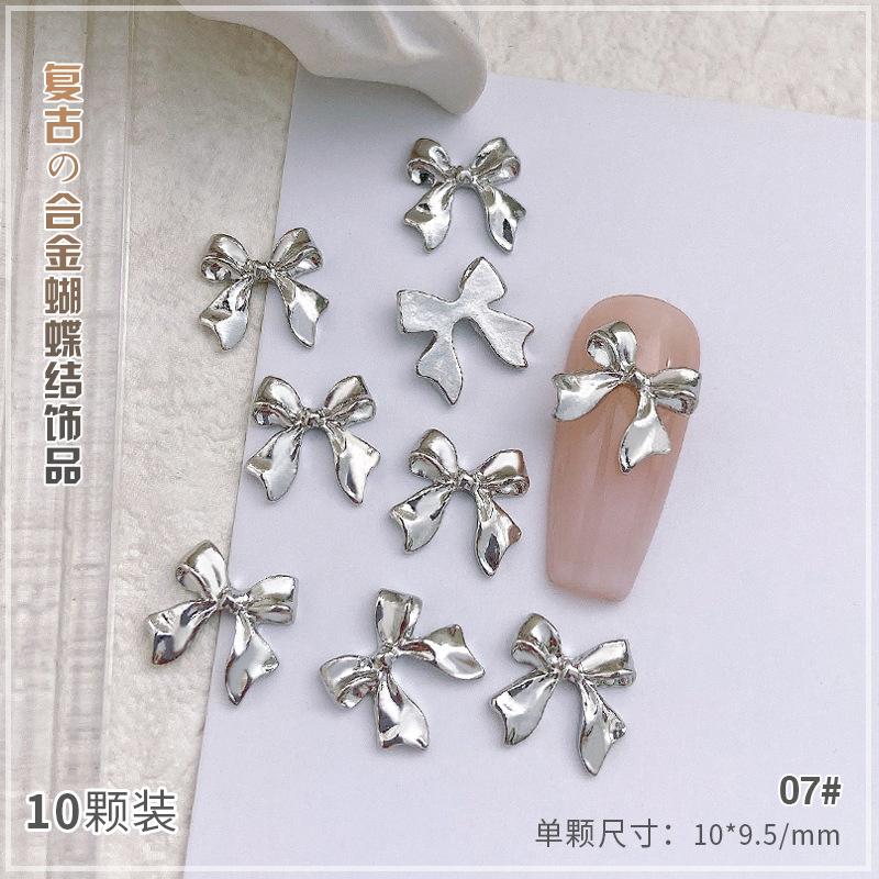 

10 шт. сплава бант для ногтей подвески украшения 3D роскошные серебряные золотые банты в форме ювелирных изделий DIY маникюр дизайн принадлежности 07#