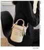 Autumn 2024 Trendy Women's Round Bucket Crossbody Bag: Solid Color, Textured, Hand-Held, and Stylish.
