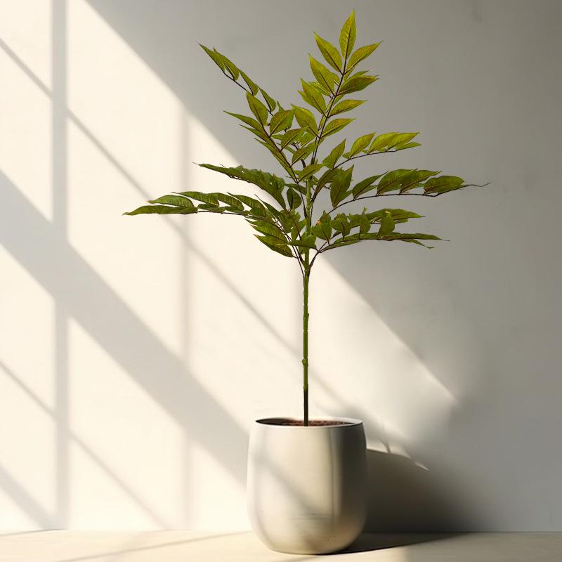 High-End Faux Potted Plant with Green Painted Wooden Leaves for Home and Courtyard Décor.