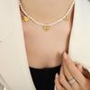 Retro Luxury Freshwater Pearl Necklace with Gold-Plated Titanium Steel Peach Heart Pendant