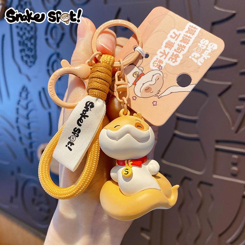 Jahr der Schlange Welpe Schlange Punkt Schlüsselanhänger Cartoon Strohhut Schlange Puppe Schultasche Anhänger Neujahrsgeschenk