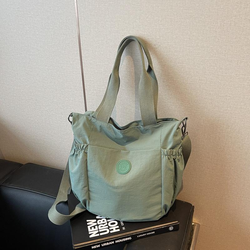 Large-capacity bag women's new spring and summer casual shoulder messenger bag texture class commuter tote bag