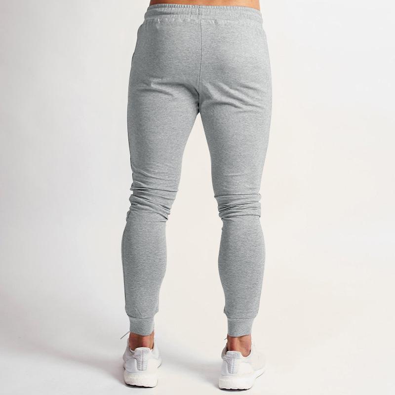 Frühling und Sommer Neue einfarbige Fitnesshose Lässige elastische Sporthose Herrenmode