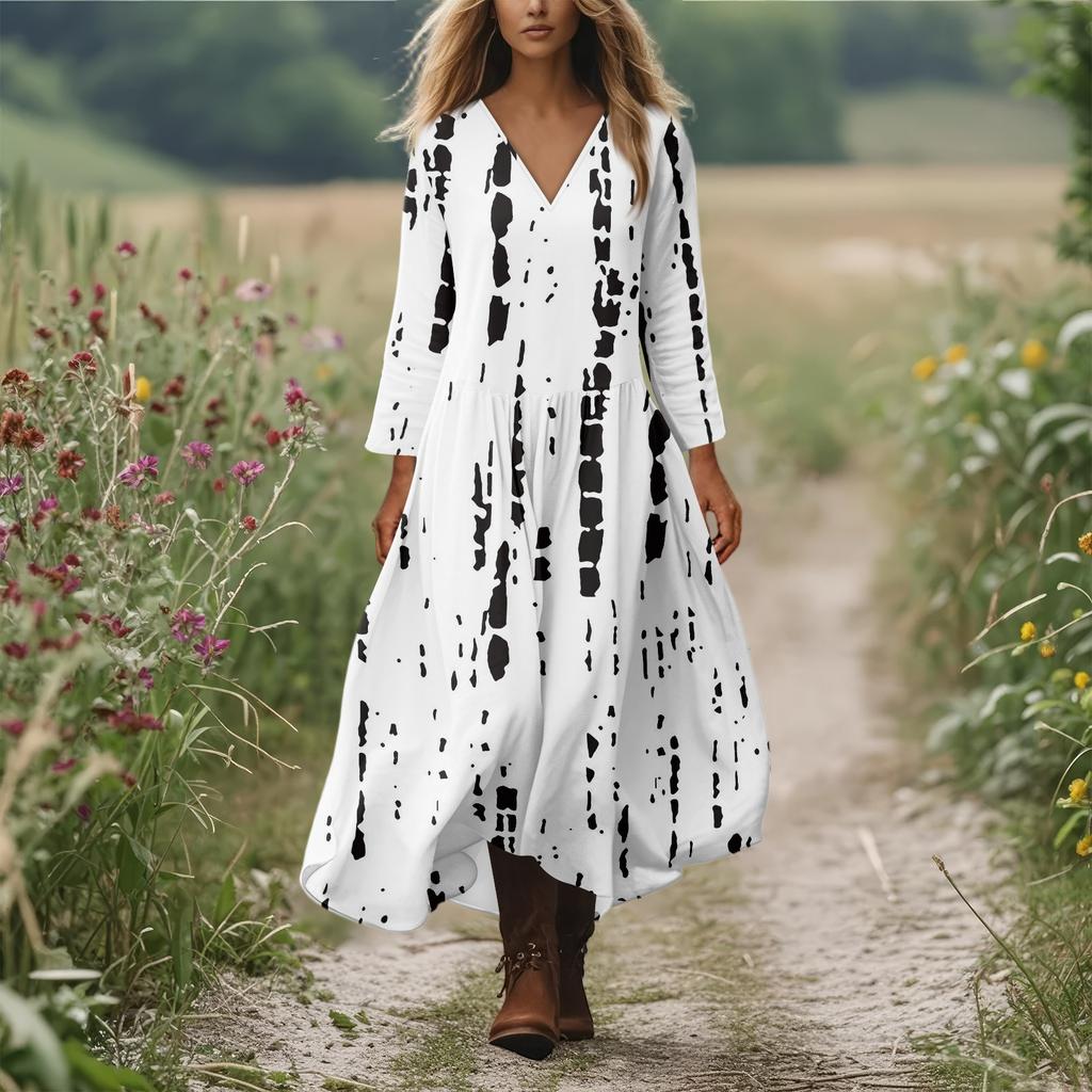 Kvinners avslappede og moteriktige rundhals langermet midilange kjole