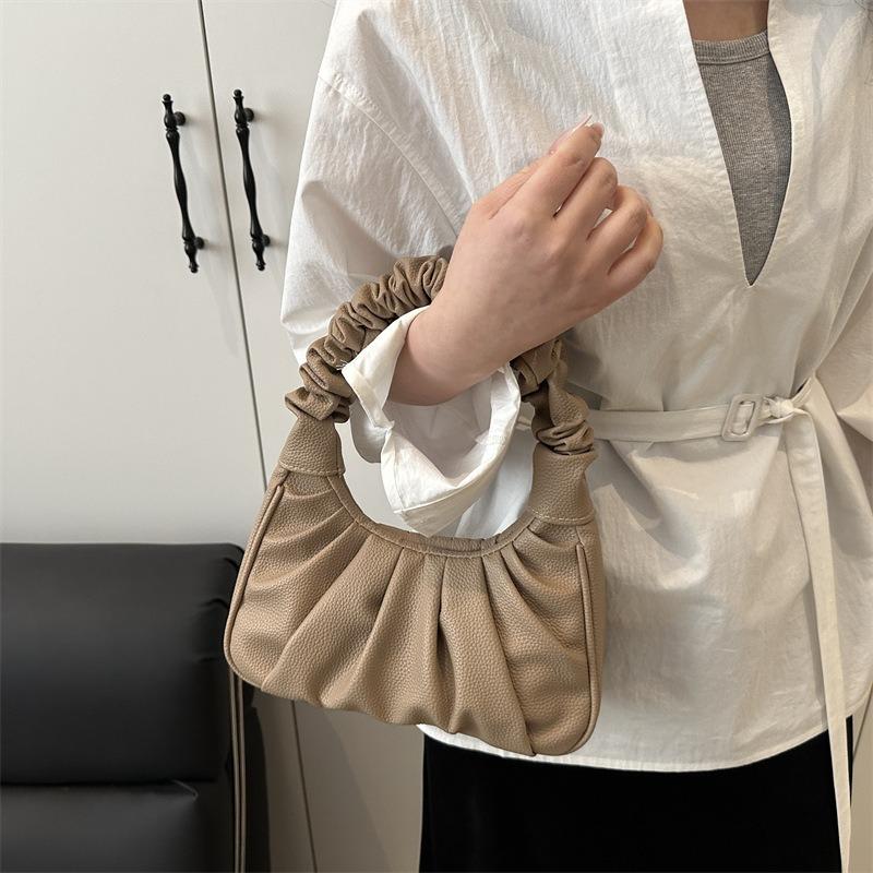 Folded portable cloud bag summer new dumpling bag beautiful solid color niche trend texture shoulder women's bag