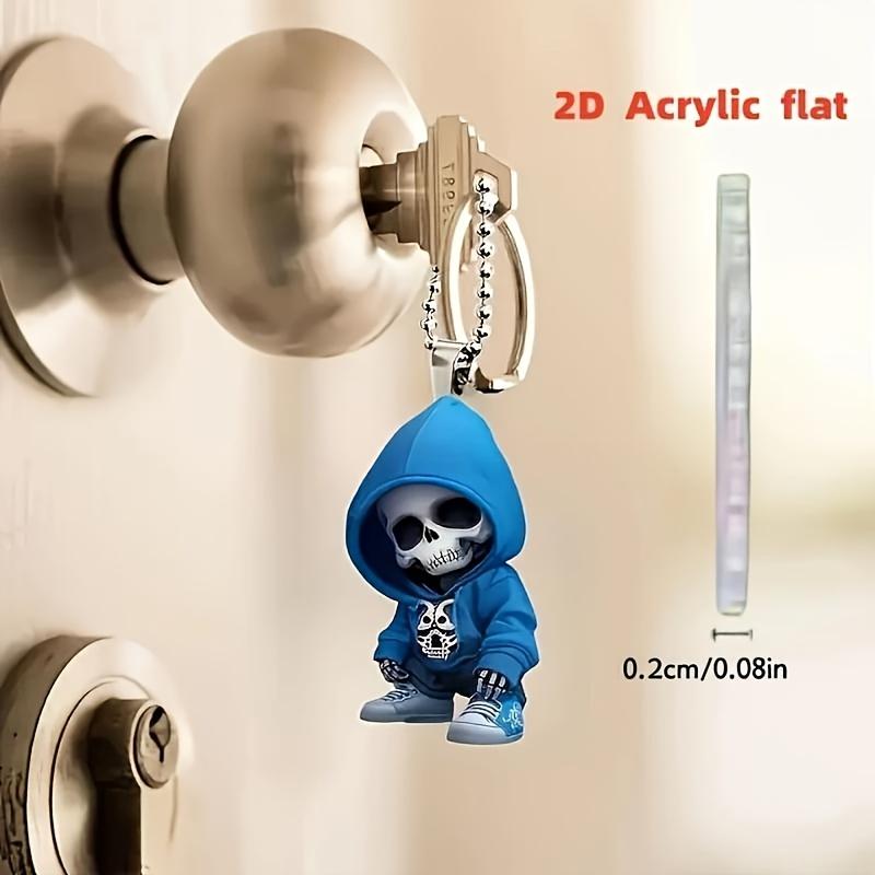 A Stylish 2D Skull Pendant with A Blue Hoodie Design, Suitable for Car Rearview Mirrors, Bags, and Home Decor