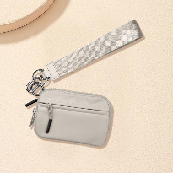 Minimyntveske med håndleddsstropp og rom for flere kortspor Glidelåslukking Bærbar