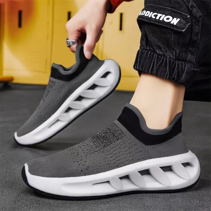 

Мужские без шнуровки прогулочные туфли Теннисные туфли с лезвием Нескользящие кроссовки Легкие тренировочные туфли Дышащая трикотажная сетка Модные мужские кроссовки 44