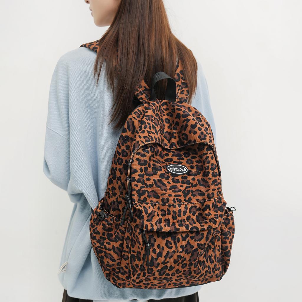 Zaino retrò con stampa leopardata zaino grande capacità moda tendenza strada coreana zaino versatile zaino per studente di scuola media