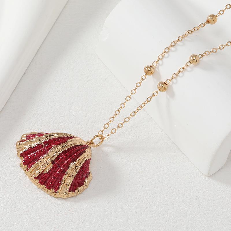 European & American Style Conch Scallop Necklace: Long Alloy Sweater Chain with Natural Shell Pendant for Women