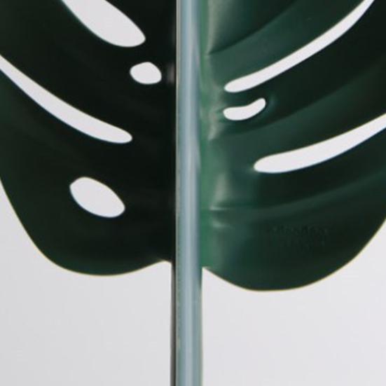 Nástroj na čištění sprchové stěrky ve tvaru zeleného listu