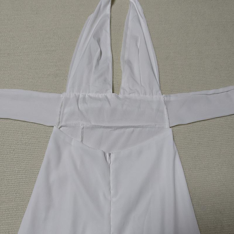 Temperamento di abbigliamento femminile europeo e americano primaverile ed estivo con scollo a V, senza schienale, spacco sexy, allacciatura, abito tinta unita