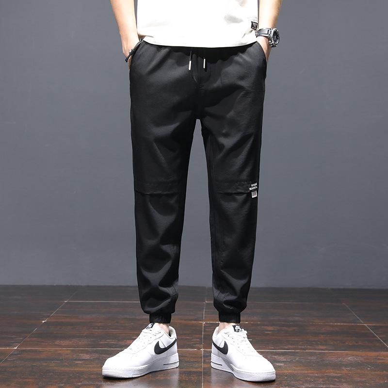Casual Pants for Men, Showing a Youthful and Thin Elastic Spring Solid Color Pants. Casual Men's Pants