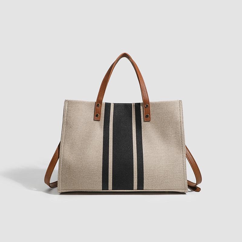 

Women S Portable Tote Bag Fashion Commuter Stripe Simple Shoulder Large Bag Large Capacity Canvas Bag