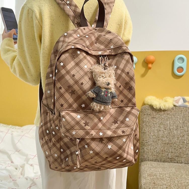 Schoolbag wholesale high school student campus backpack female ins wind small fresh plaid load reduction spine bag commuter backpack