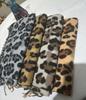 Leopard Print Thickened Imitation Cashmere Scarf with Tassels - Warm, Windproof and Versatile Shawl for Autumn and Winter.