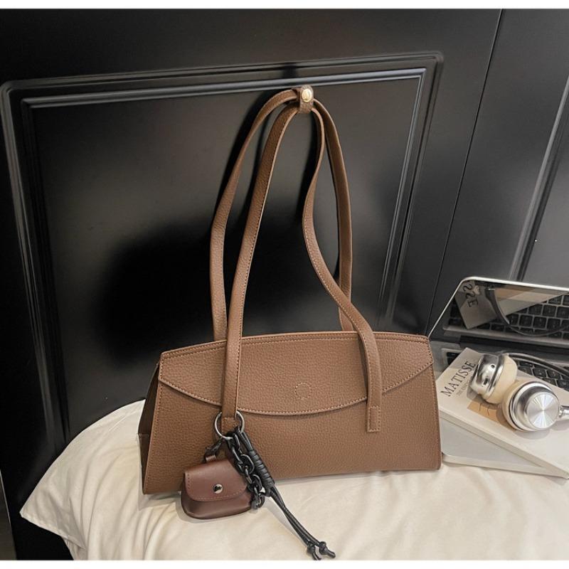 Ein-Schulter-Tasche, Modische Achseltasche, Trendiger Design-Sinn, Pendler-Handtasche