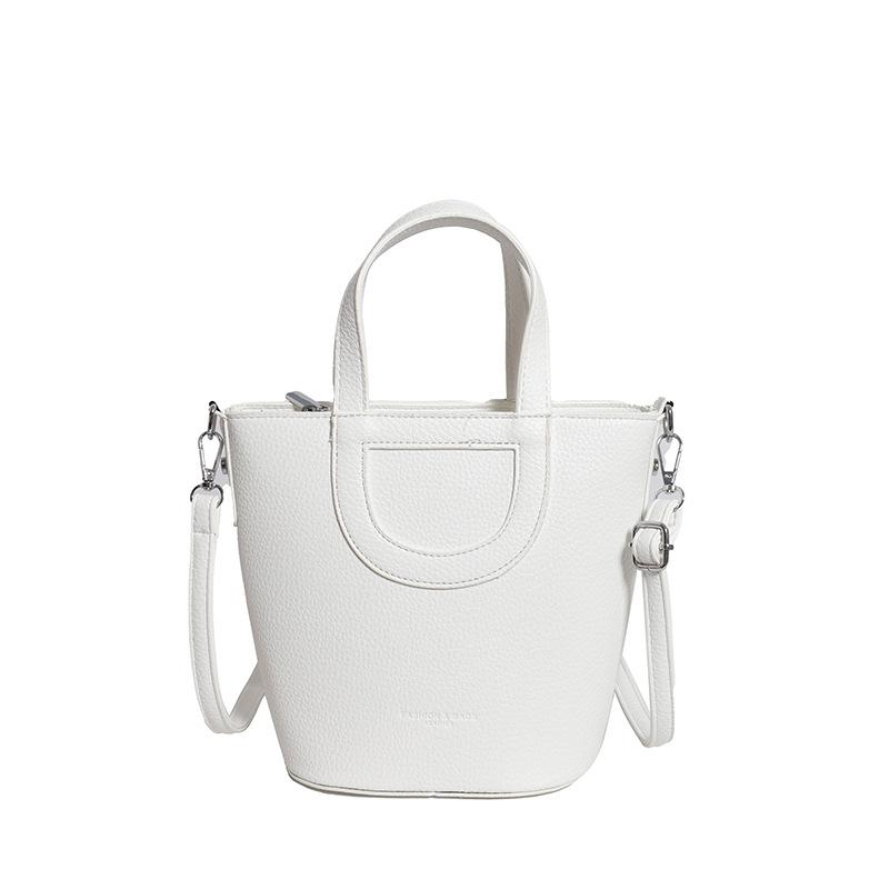 

Большая вместимость, ощущение моделирования, мягкая и прочная, модная, изысканная, новая, легкая роскошь, для поездок на работу, на плечо через плечо, ручная, сумка-ведро белый