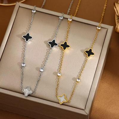 Europäisch-Amerikanischer Grenzüberschreitender Vierblättriger Klee Titanstahl Halskettenanhänger - High-End Design Schmuck.