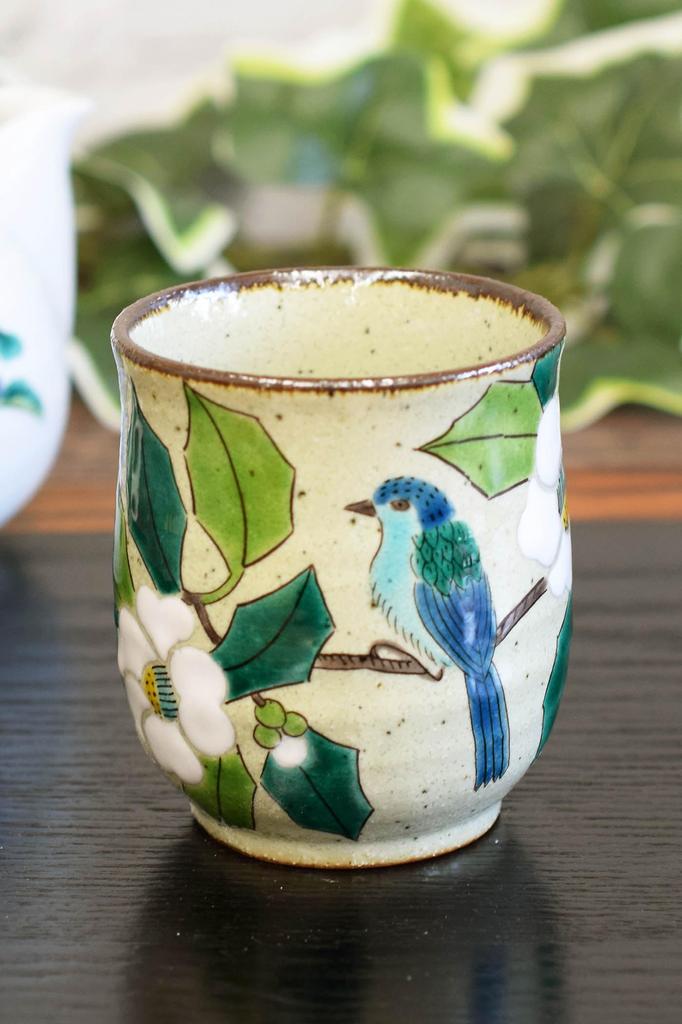 Stylish Kutani Ware Teacup Featuring a White Camellia and Bird Design. Made In Japan. A Brand of Ceramic.