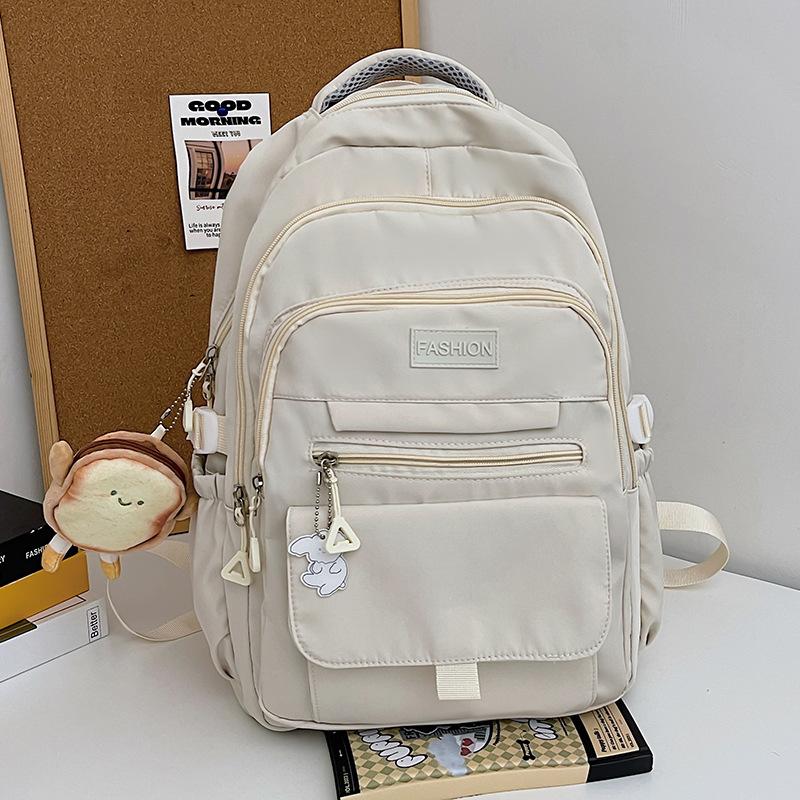 Korean version of simple backpack large capacity junior high school male and female students campus schoolbag backpack light