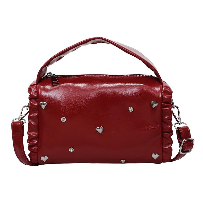 Dumpling bags are popular this year, women's 2025 new Korean version fashion rivet messenger bag pleated shoulder pillow bag