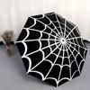 Compact Umbrella Featuring a Spider Web Pattern On a Black Backdrop. an Innovative And Portable Folding Umbrella,Perfect for Gifting On Any