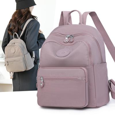 Mochila nova de verão feminina simples de grande capacidade para viagem bolsa pequena simples mochila moderna e leve mochila escolar
