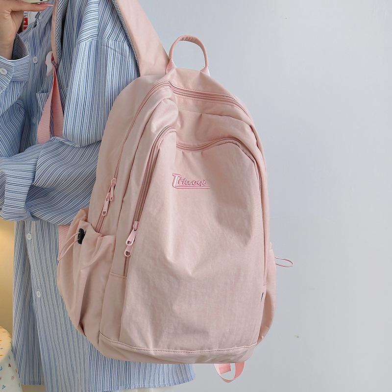 Schoolbag Korean ins style solid color small fresh schoolbag female, junior high school girl high school student backpack lightweight travel backpack