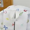 Cute Bow Tie Print School Backpack Lightweight Nylon Zipper Daypack with Front Pocket for Teen Girls Daily Travel