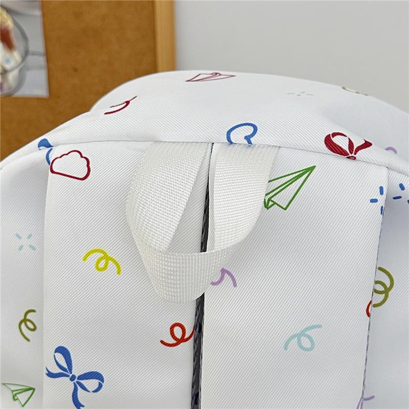 Cute Bow Tie Print School Backpack Lightweight Nylon Zipper Daypack with Front Pocket for Teen Girls Daily Travel