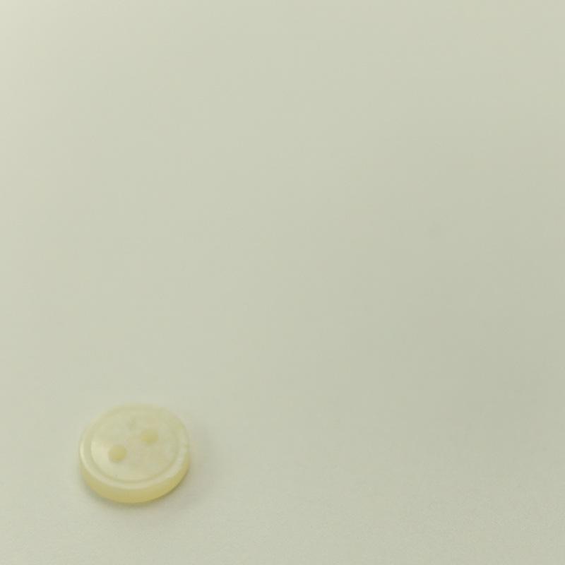 

Resin Two-Hole Double Ring Buttons: Random Pattern for Shirts, Sweaters, Cardigans, Sleeves, and Collars