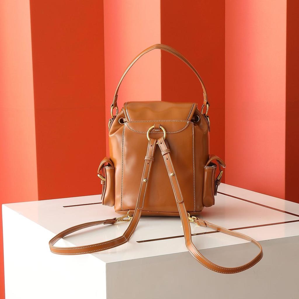 Nový Miao miu 2025 plátěný batoh velkokapacitní prémiový pocit všestranný přenosný ramenní cestovní dojížděcí batoh