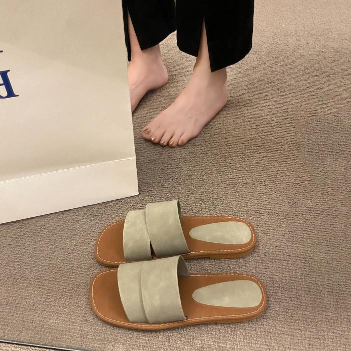 2024 summer new flat-bottomed niche simple one-word cool slippers female soft-soled fairy wind open-toed beach shoes