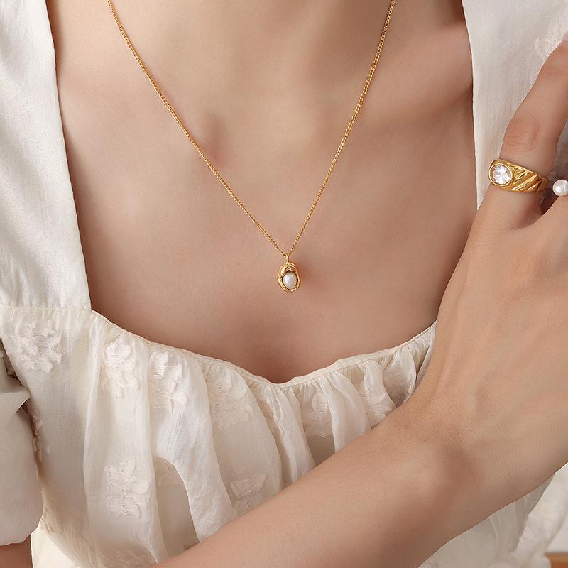 Gold-Plated Titanium Steel Cuban Chain Necklace with Freshwater Pearl Irregular Pendant.